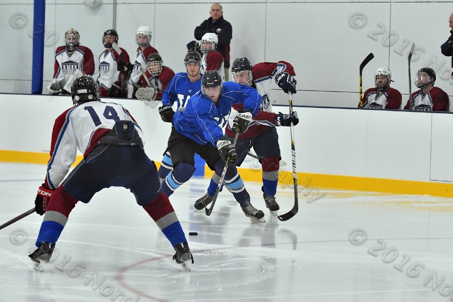 Wheaton College Men\'s Ice Hockey vs Middlesex Community College. - Photo By: KEITH NORDSTROM